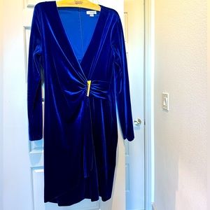 Calvin Klein faux wrap velvet dress. Beautiful blue color with gold accent.